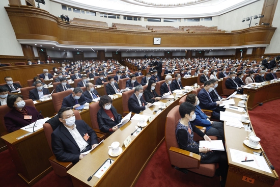  3月7日，全国政协十三届五次会议举行视频会议。会议在全国政协机关设主会场，在委员驻地设分会场。这是主会场。新华社记者 刘彬 摄